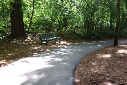 Paved perimeter trail has many benches and picnic tables along the route